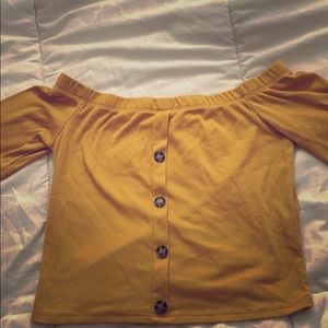 I’m selling a yellow crop top off shoulders